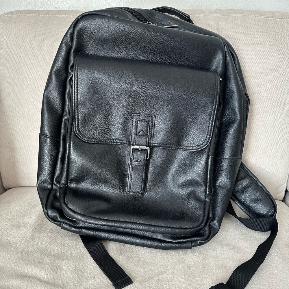Reaction Kenneth Cole Black Leather Backpack single front buckle